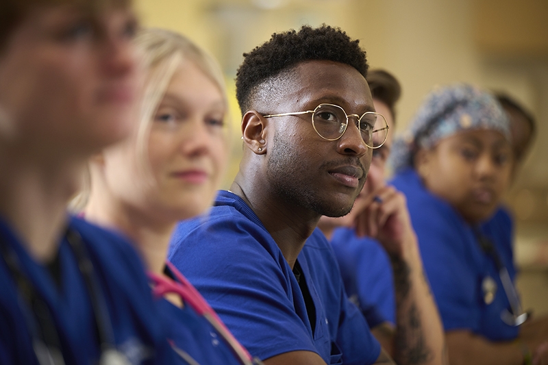 Goldfarb nursing students sitting in front of a classroom setting.