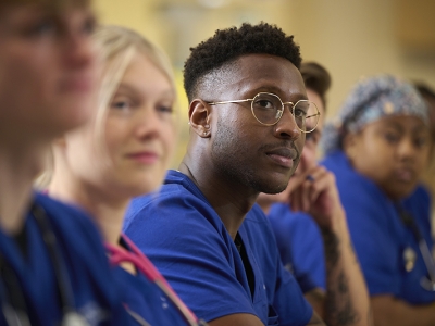 Goldfarb nursing students sitting in front of a classroom setting.